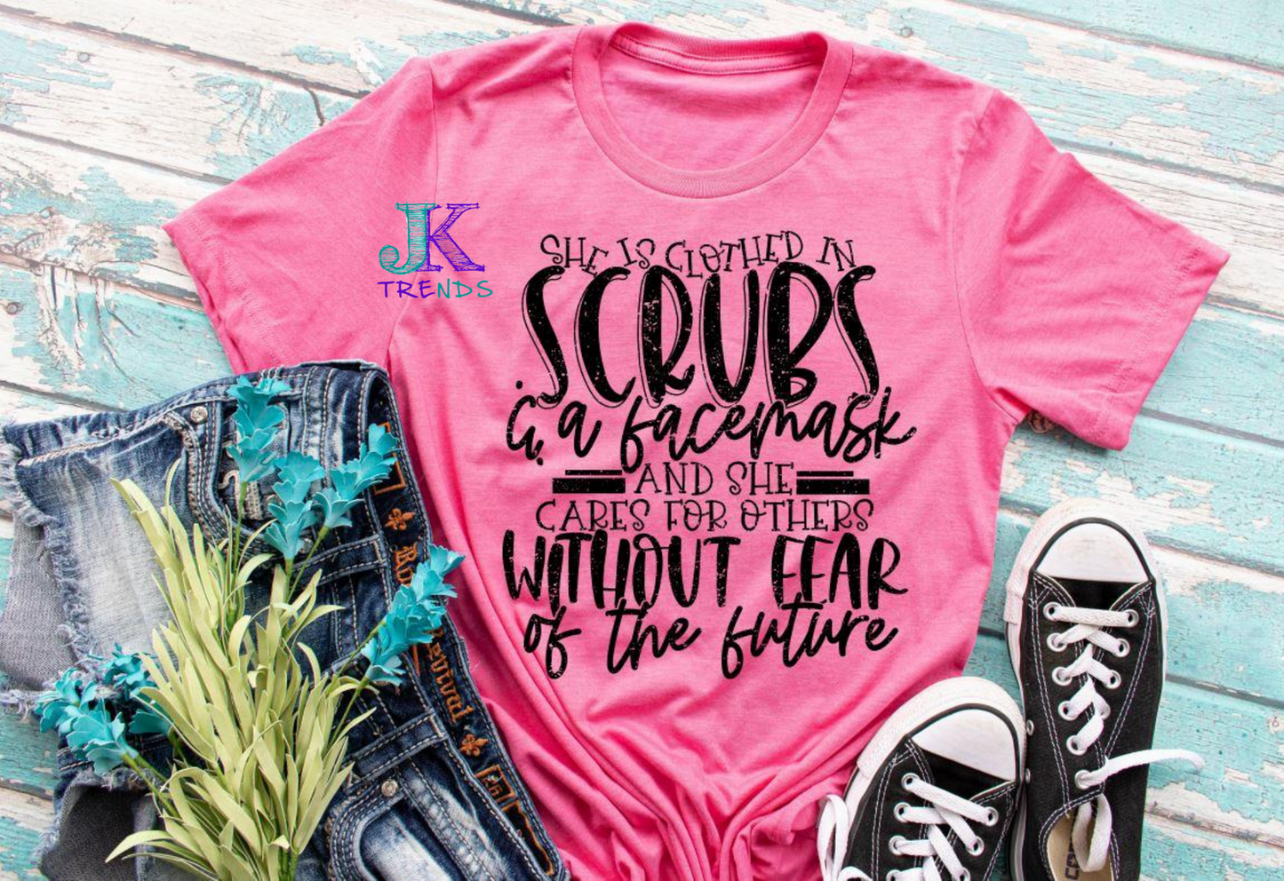 She is clothed in Scrubs....