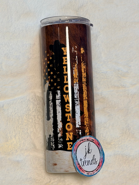 Tumbler with 'Yellowstone' design and American flag on a textured surface, accompanied by a 'jk trends' label.