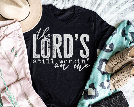 the Lord's still workin' on me