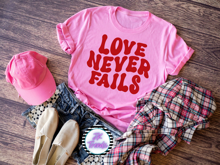 Love Never Fails Valentine Retro Stacked Adult Shirt Bella Canvas